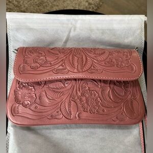 Hand tooled leather clutch/wristlet/crossbody bag